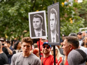 Charlie Kirk posters at an anti-immigration rally in Canada in September 2025 (Image via Shutterstock.com)